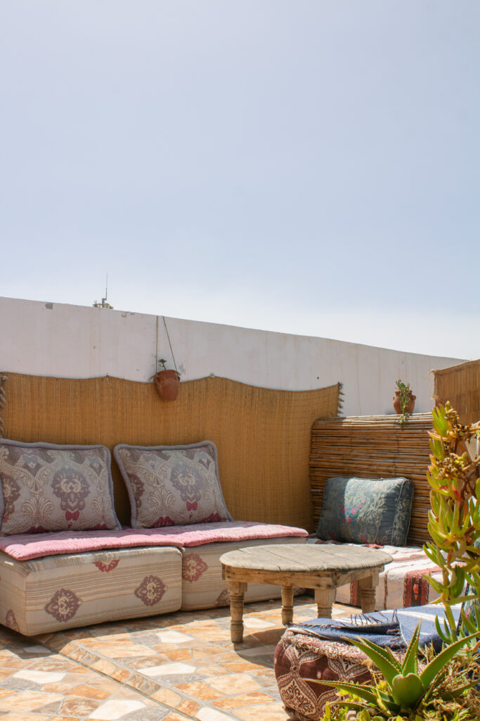 A sunny terrace with Moroccan cushions